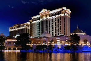 Caesars Palace Las Vegas hotel and casino exterior at night amid Caesars Entertainment data breach lawsuit allegations