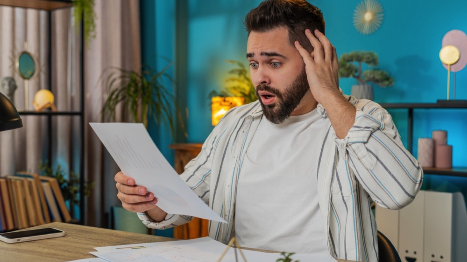 Crucial Money Mistakes Even Frugal People Make 171 Frustrated man with bill