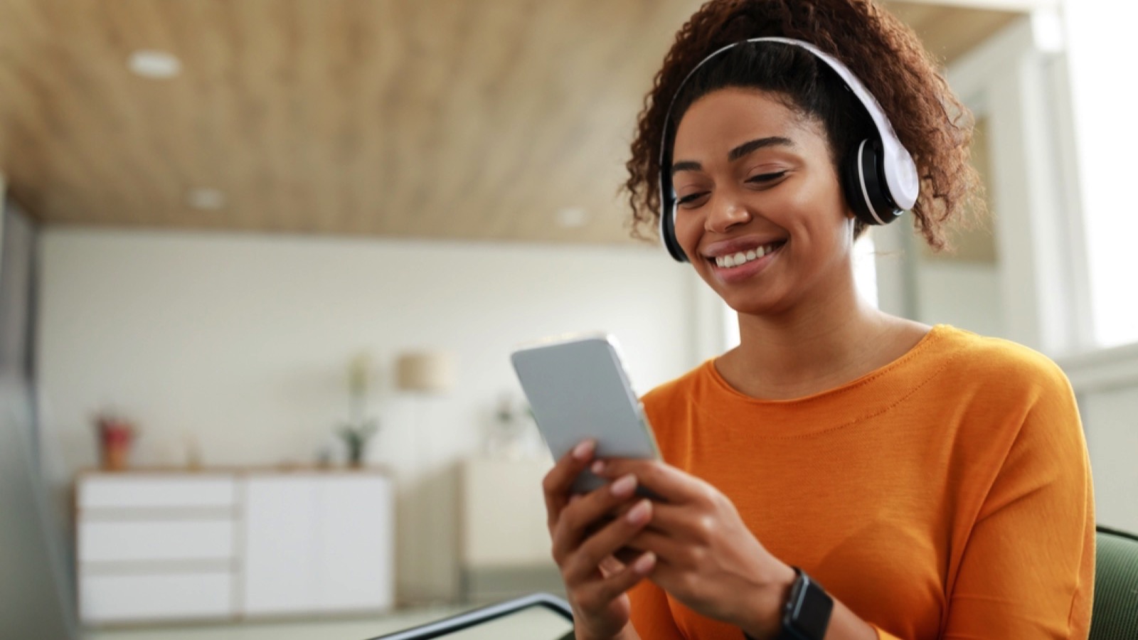 These Surprising Household Products Were Invented by NASA 108 Woman wearing wireless headset
