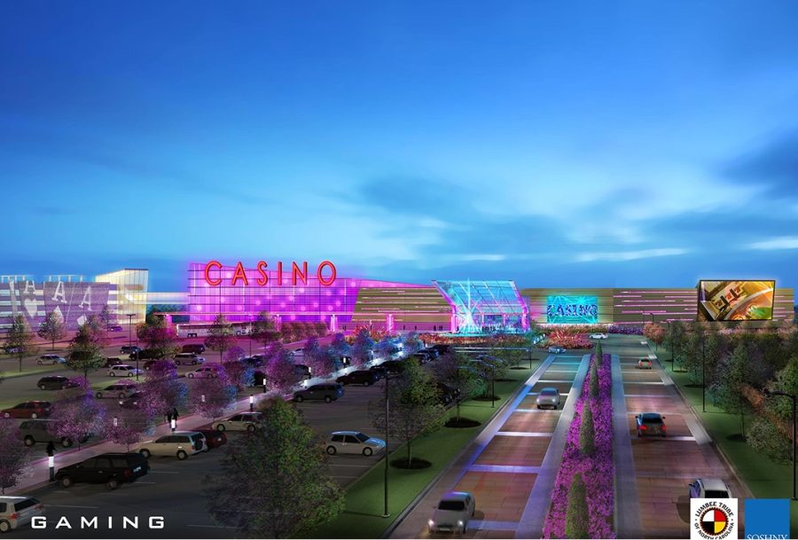 Rendering of the proposed Lumbee Dark Water Resort casino development in North Carolina featuring illuminated gaming facilities, entertainment venues, and landscaped entrance roads.