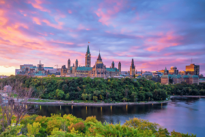 Panoramic view of Ottawa Parliament Hill at sunset with colorful sky over the Ottawa River in Canada. Ontario regulated gambling market now captures overwhelming majority of online players