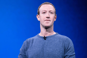 Meta CEO Mark Zuckerberg speaks onstage during a company event. Reports suggest Meta is exploring a standalone prediction market app known internally as Arena, potentially expanding beyond its core social media platforms.