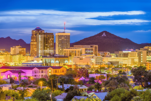 Phoenix, Arizona skyline at dusk with downtown buildings and A Mountain, illustrating Arizona gaming regulator enforcement news. Arizona orders five online gambling operators to halt activities