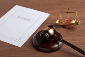 Court gavel, scales of justice and legal documents illustrating the CFTC insider trading lawsuit against US Army soldier Gannon Ken Van Dyke over alleged Polymarket prediction market trades.