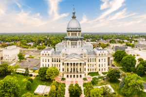 Aerial view of the Illinois State Capitol building in Springfield amid the state's federal prediction markets legal dispute.