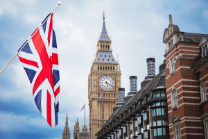 Union Jack flying in front of Big Ben in London, illustrating UK Gambling Commission financial risk assessments replacing affordability checks.