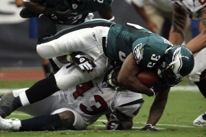 NFL football player tackled during a game as league targets prediction market betting contracts. NFL renews push to remove football contracts from prediction markets exchanges