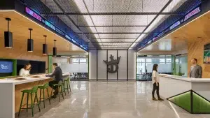Interior of a DraftKings office featuring the company logo and sports betting displays.
