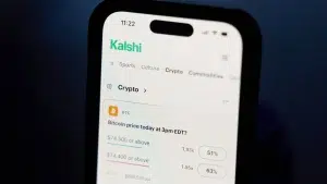 A smartphone displaying the Kalshi app interface with Bitcoin price prediction markets.