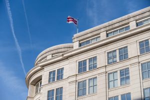 Office building in Washington, DC with the District of Columbia flag on the roof